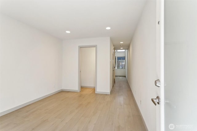 4407 42nd Ave SW Unit D, Seattle, WA 98116 - spare room featuring recessed lighting, baseboards, and light wood finished floors