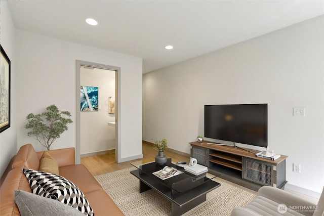 4407 42nd Ave SW Unit D, Seattle, WA 98116 - living room with wood finished floors, baseboards, and recessed lighting
