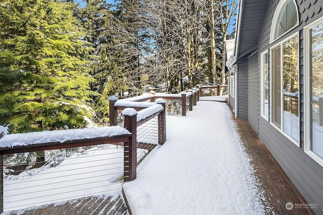 view of snow covered deck