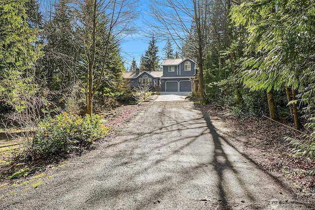 view of road featuring driveway