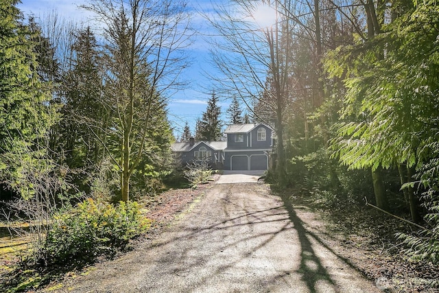 view of road featuring driveway