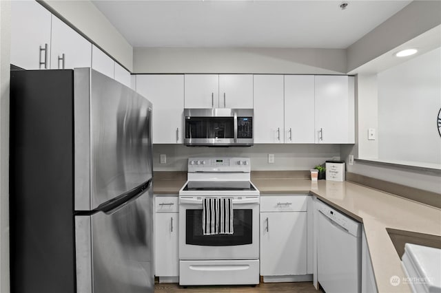 kitchen with white cabinetry and appliances with stainless steel finishes