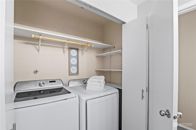 washroom with washer and clothes dryer