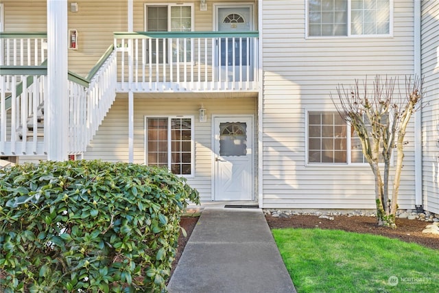 property entrance with a balcony