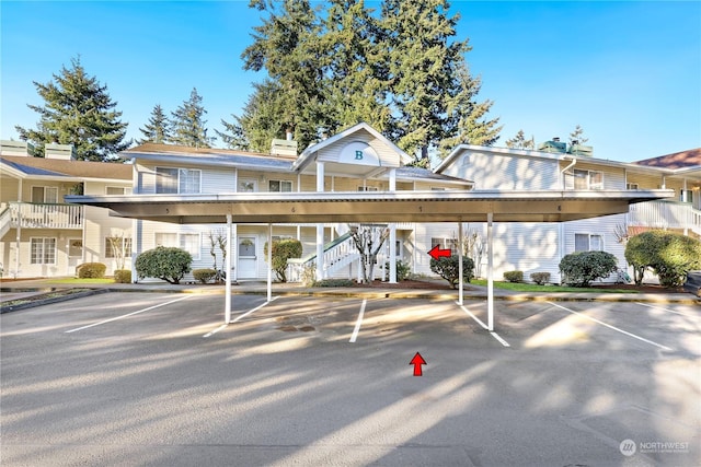 view of parking with a carport