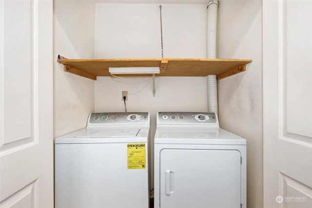 washroom featuring independent washer and dryer