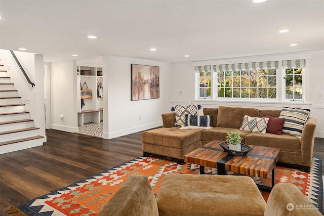 living room with dark hardwood / wood-style floors