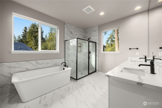 bathroom with visible vents, marble finish floor, a sink, recessed lighting, and a marble finish shower