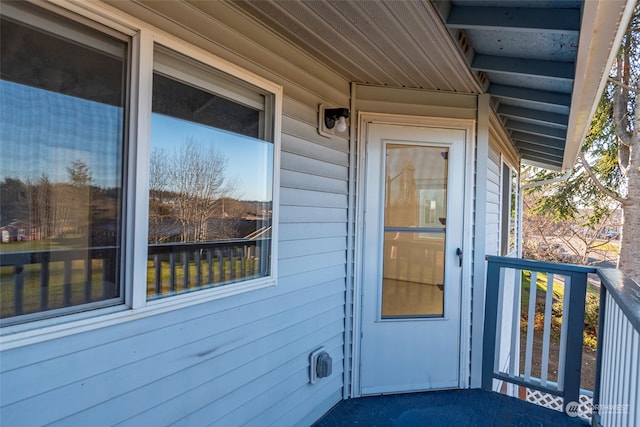 doorway to property with a balcony