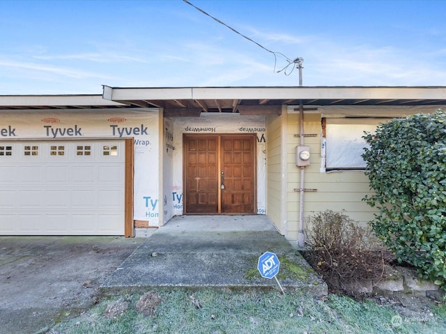 property entrance featuring a garage