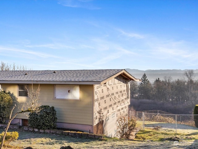 view of home's exterior featuring a mountain view