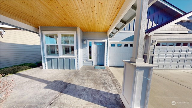 entrance to property featuring a garage