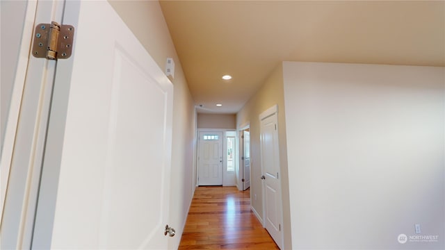 corridor featuring light hardwood / wood-style flooring