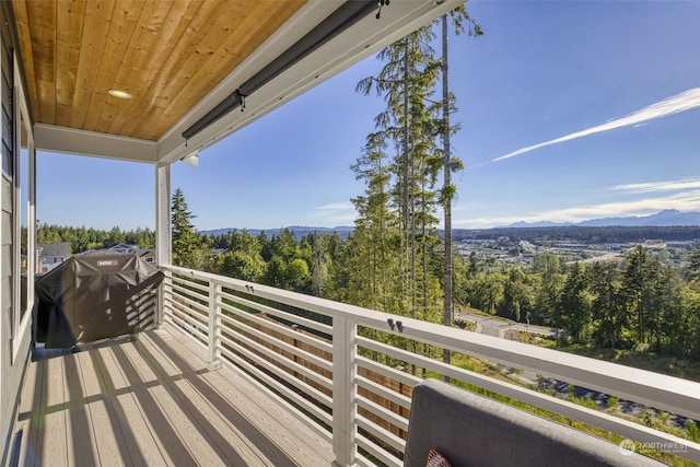 balcony featuring a mountain view