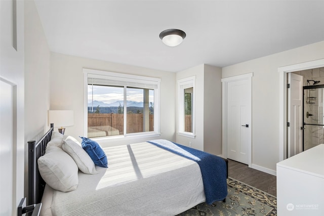 bedroom featuring dark wood-type flooring