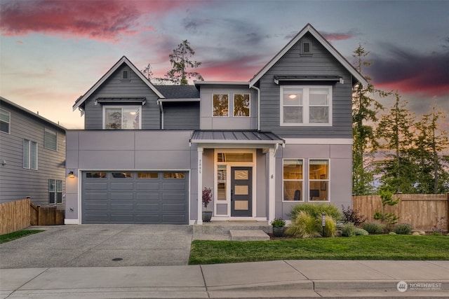 view of front of property featuring a garage