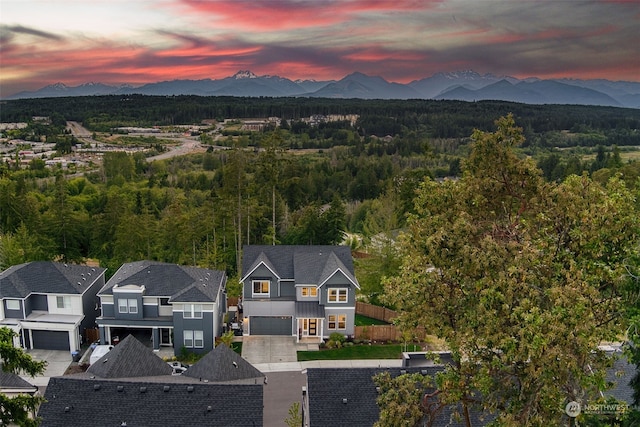 aerial view at dusk with a mountain view