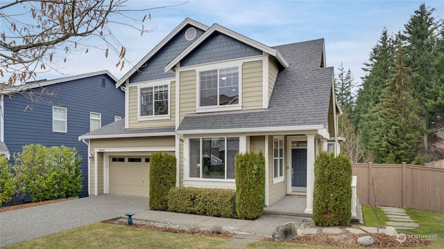 view of front of property with a garage