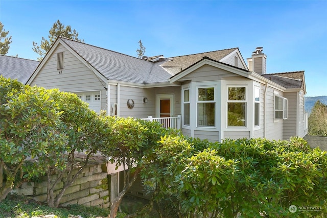 view of side of property featuring a garage