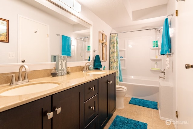 full bathroom featuring tile patterned flooring, shower / tub combo, vanity, and toilet