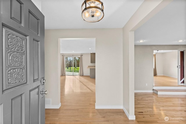 entrance foyer with light wood-type flooring