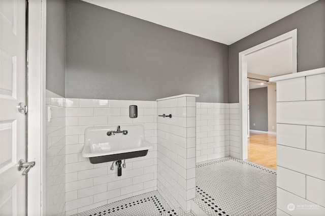 bathroom with tile patterned floors