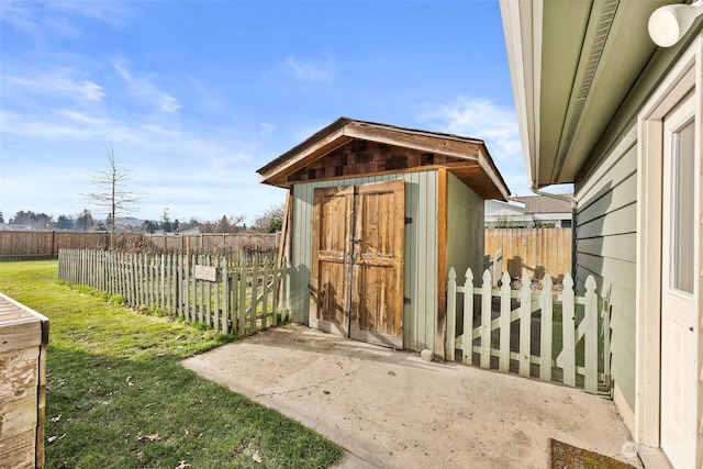 view of outbuilding with a lawn