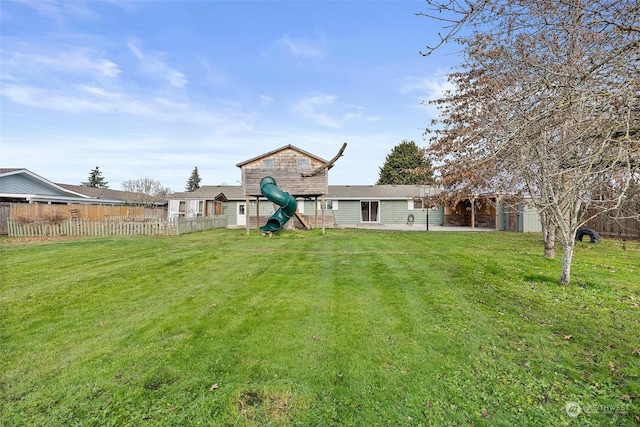 view of yard featuring a playground