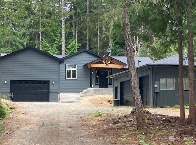 view of front of home with a garage