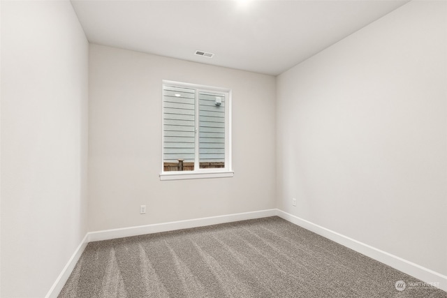 view of carpeted spare room