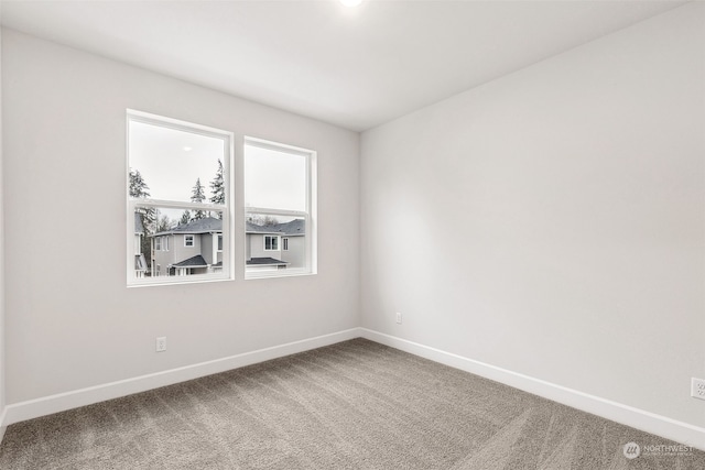 empty room with carpet floors