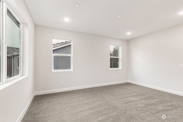 view of carpeted spare room