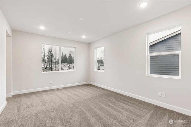 empty room featuring carpet