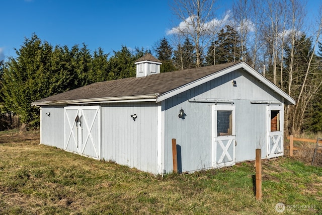 view of outbuilding featuring an outdoor structure