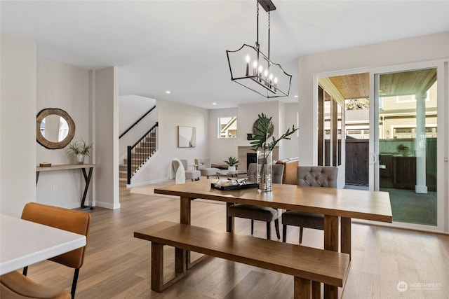 dining area with hardwood / wood-style floors