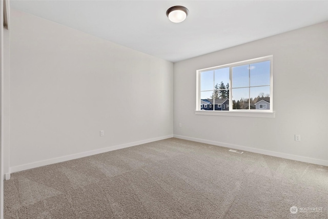 empty room with carpet floors