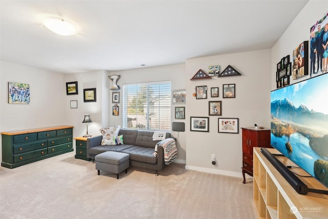 living room featuring light carpet