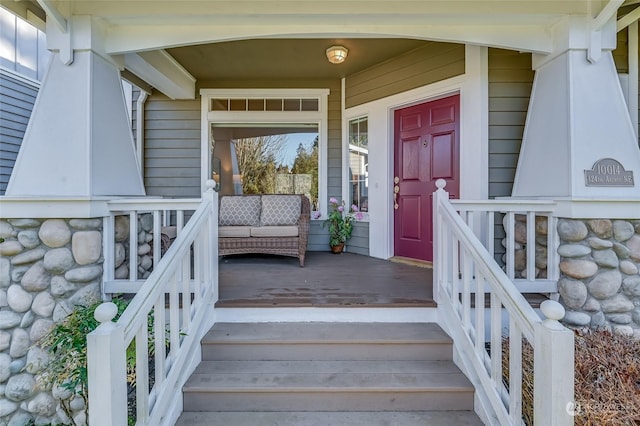 entrance to property with a porch