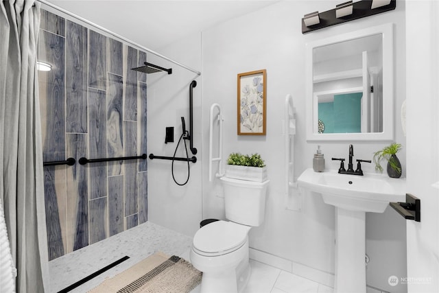 bathroom featuring walk in shower, tile patterned floors, and toilet