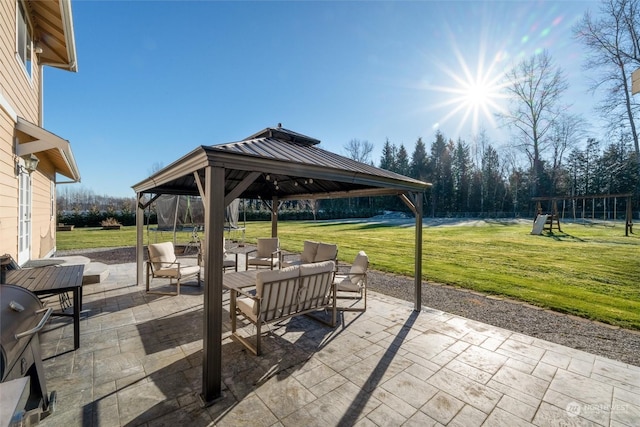 view of patio featuring a gazebo and outdoor lounge area