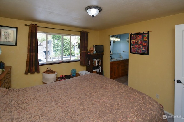 bedroom with connected bathroom