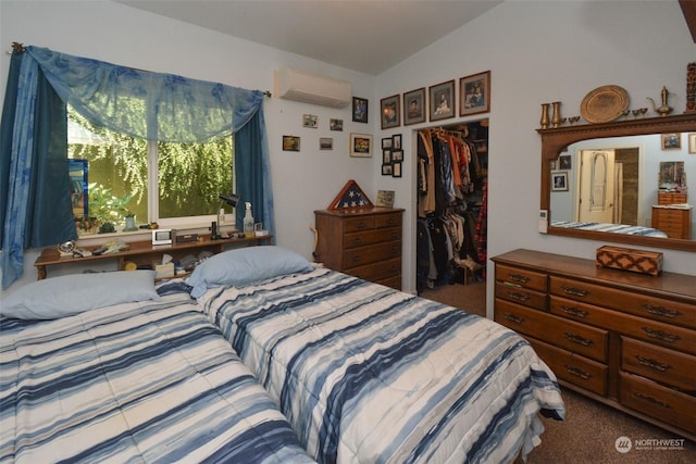 carpeted bedroom featuring lofted ceiling, a closet, and a wall mounted AC