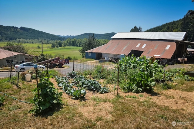 exterior space with a rural view