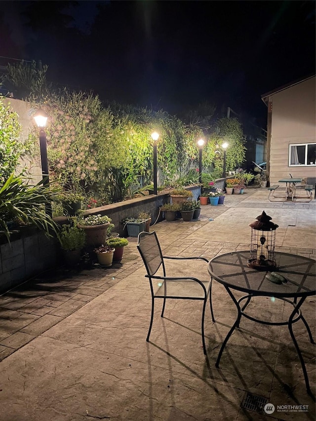 view of patio at night