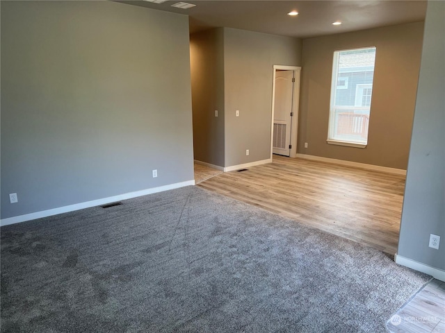 empty room with light wood-type flooring