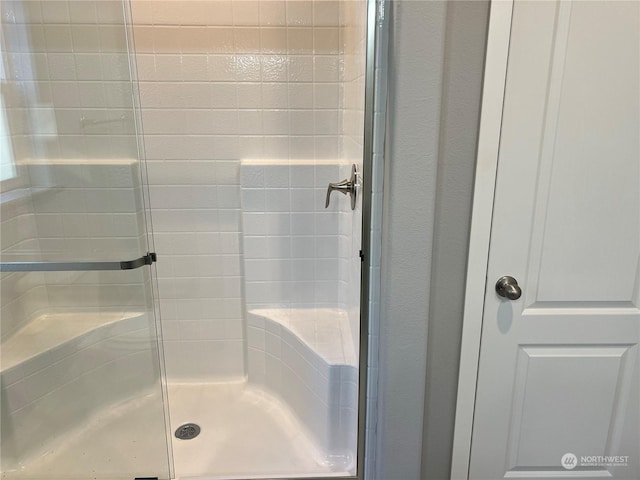 bathroom with an enclosed shower