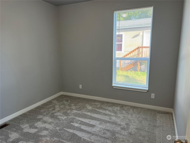 empty room featuring carpet