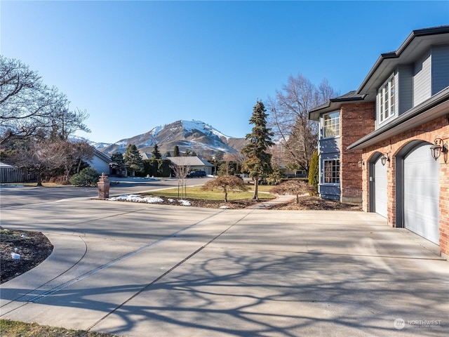 exterior space featuring a mountain view