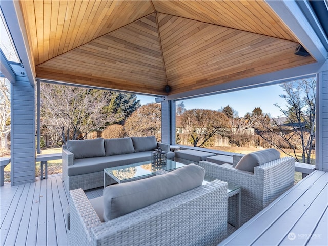 wooden deck with outdoor lounge area