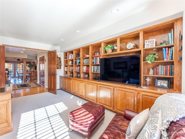 carpeted living room with french doors